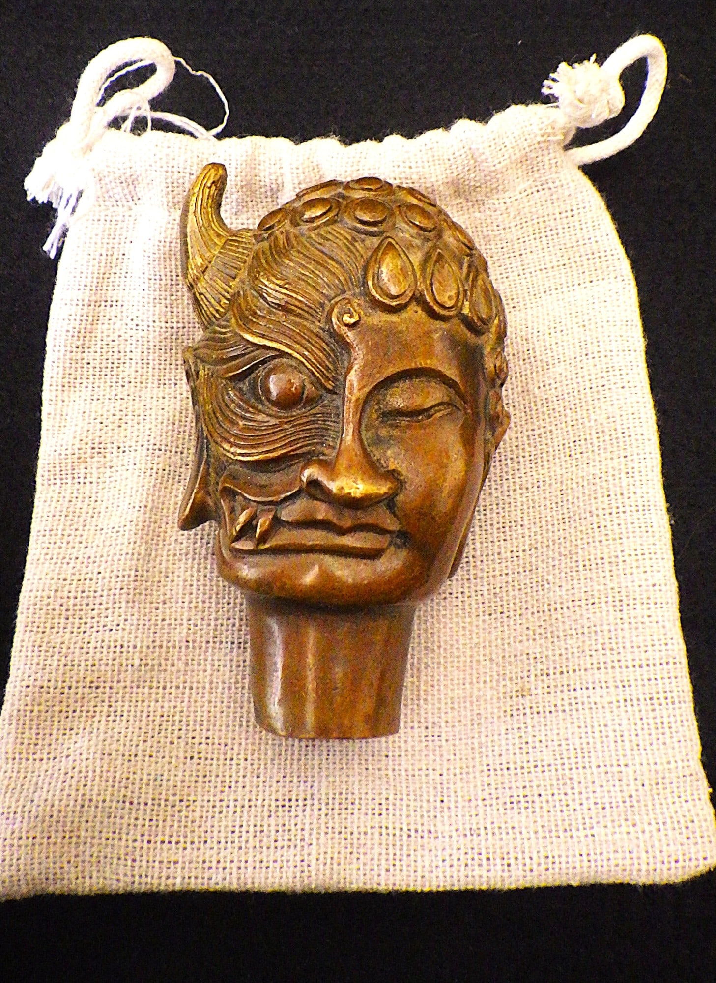 A Tibetan Bronze Buddha Head With The Two Sides of Life (Good & Bad): Title: A Tibetan Bronze Buddha Head With The Two Sides of Life (Good & Bad) Description: A Tibetan, Buddhist, bronze, walking stick head with the two sides of life (good & bad). 