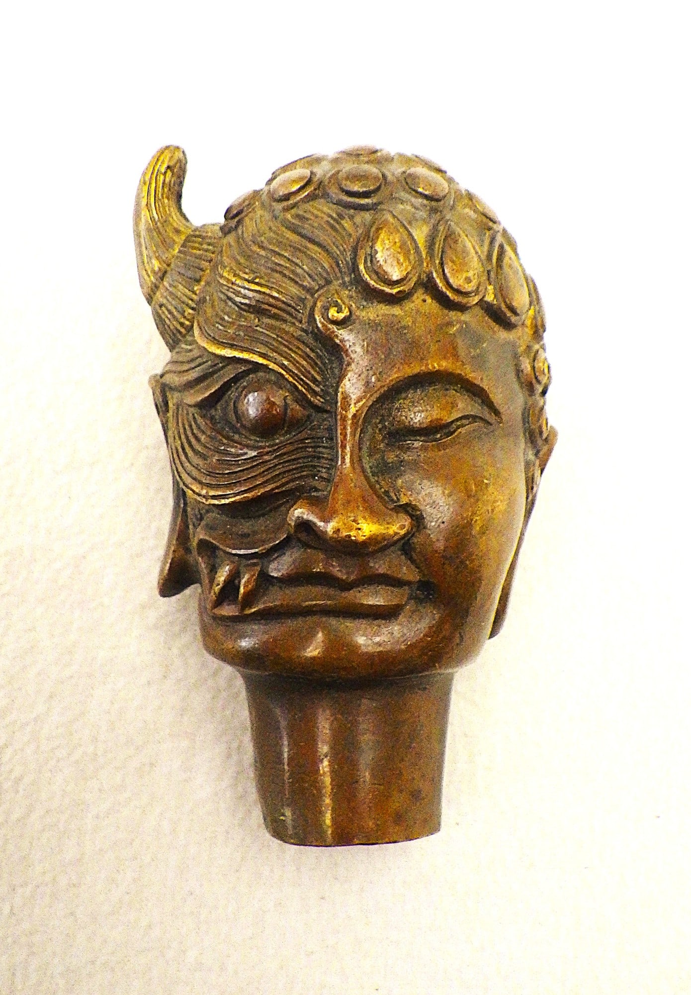 Title: A Tibetan Bronze Buddha Head With The Two Sides of Life (Good & Bad) Description: A - 2