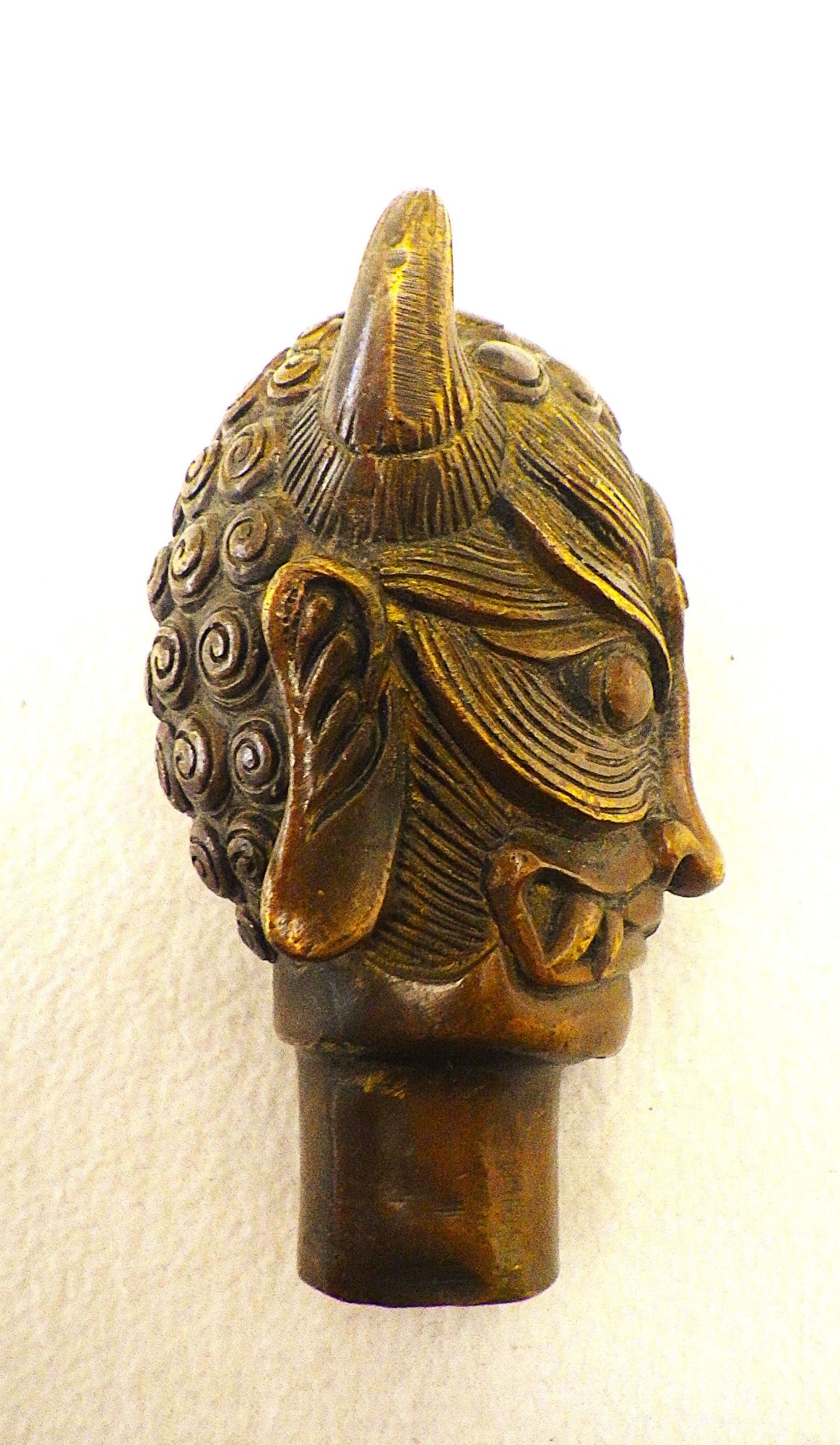 Title: A Tibetan Bronze Buddha Head With The Two Sides of Life (Good & Bad) Description: A - 4