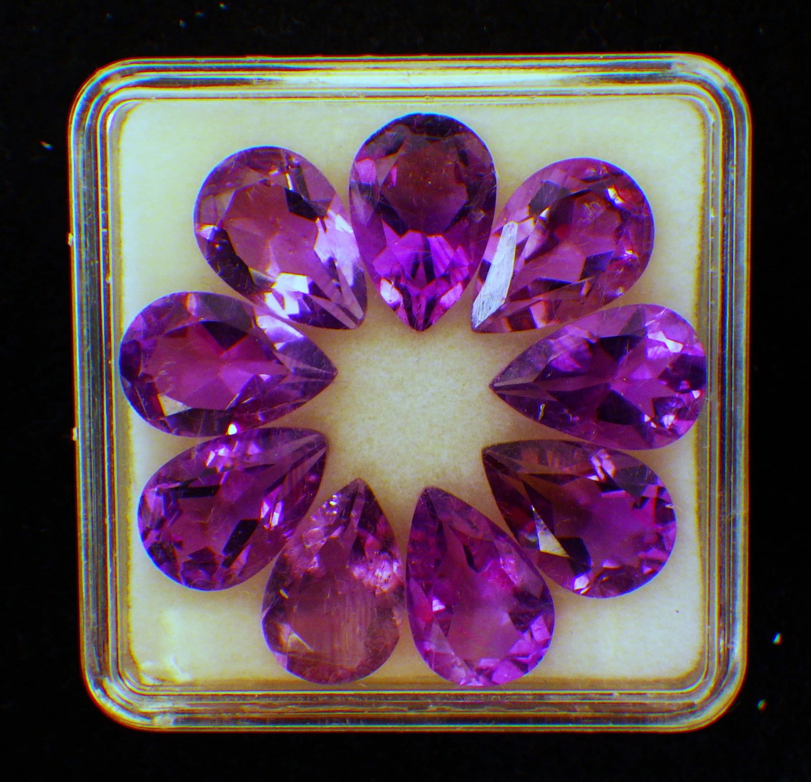 Nine Pear Cut Amethysts 11 mm: Title: Nine Pear Cut Amethysts 11 mm Description: A wonderful group of nine, pear cut amethysts, with excellent colour saturation and uniformity. Height: 11 mm. Origin: Brazil.&