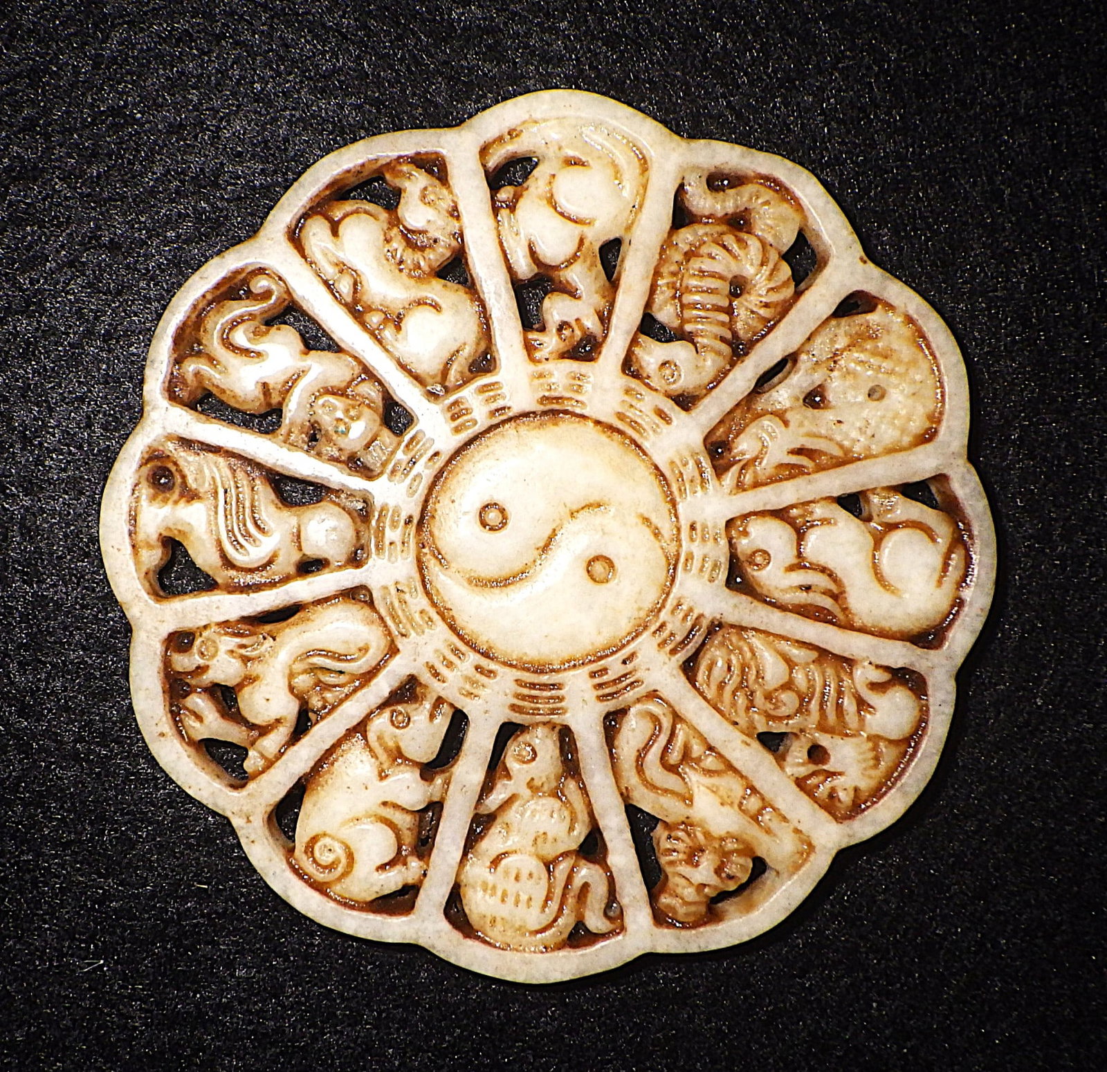 A Vintage Chinese Hand Carved White Jade Amulet With The Chinese Zodiac: Title: A Vintage Chinese Hand Carved White Jade Amulet With The Chinese Zodiac Description: A Vintage Chinese hand carved white jade amulet with the Chinese zodiac. Dimensions: 70 x