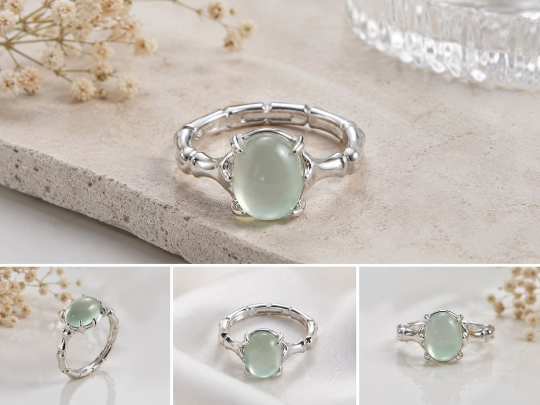 Pale Green Cabochon Silver Tone Ring: Title: Pale Green Cabochon Silver Tone Ring Description: Elegant silver-tone ring featuring a smooth oval pale green cabochon stone in a polished prong setting. A stylish and delicate design suitable