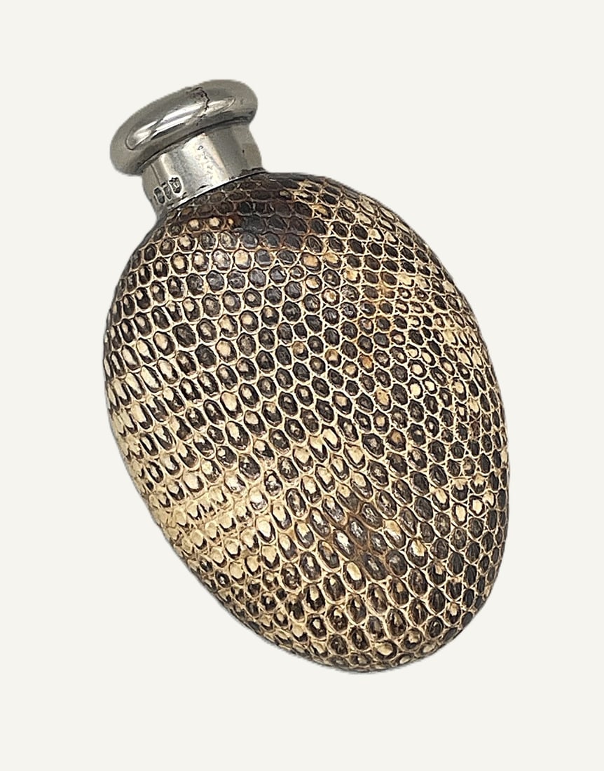 Victorian Ceramic Snakeskin Scent Bottle: Title: Victorian Ceramic Snakeskin Scent Bottle Description: Silver mounted ceramic scent bottle made to look like snakeskin. Silver cap, which is engraved with the initials ED, carries an