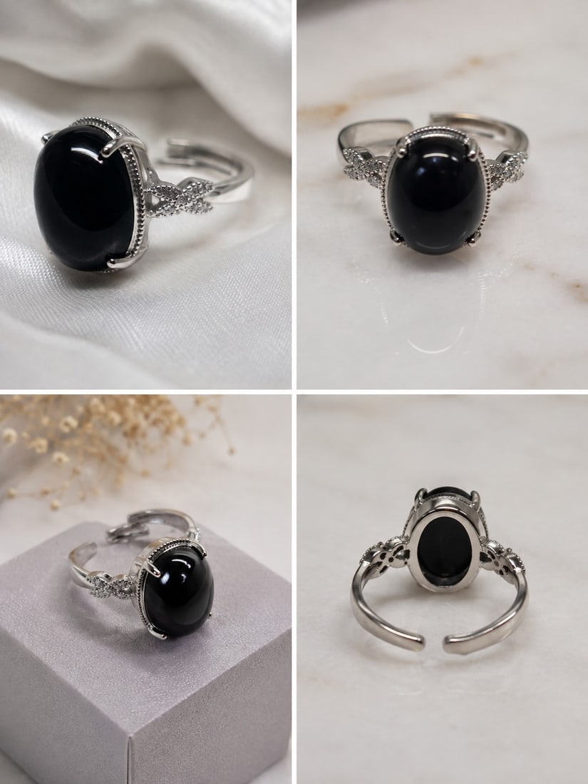 Black Oval Cabochon Adjustable Silver-Tone Ring: Title: Black Oval Cabochon Adjustable Silver-Tone Ring Description: Elegant adjustable silver-tone ring featuring a polished oval black cabochon stone in a decorative four-prong setting. The band is