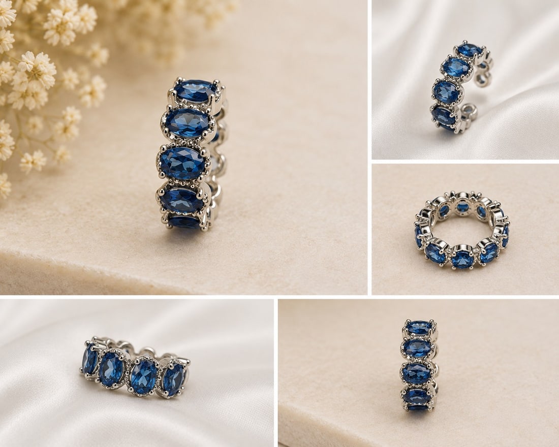 Blue Oval Gemstone Eternity Ring – Silver Tone: Title: Blue Oval Gemstone Eternity Ring – Silver Tone Description: Elegant eternity-style ring set all around with faceted oval blue gemstones in individual claw settings. The continuous design