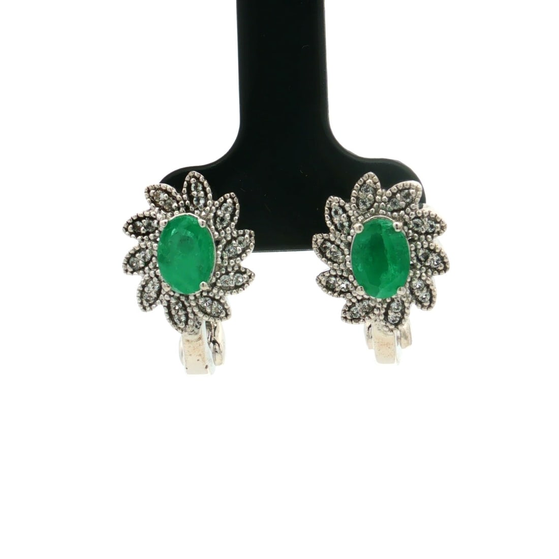 HRD Certified Sakota Emerald & White Topaz Earrings – 925 Sterling Silver: Title: HRD Certified Sakota Emerald & White Topaz Earrings – 925 Sterling Silver Description: A fine pair of 925 Sterling Silver earrings featuring oval Sakota Emerald gemstones