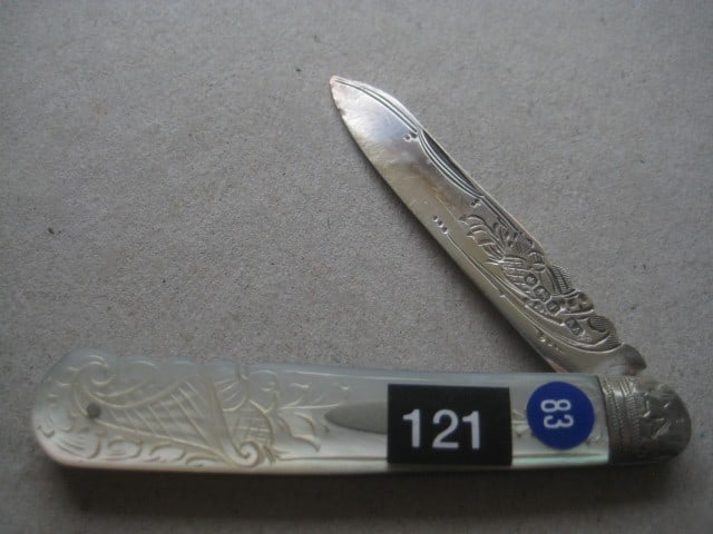 George V Mother of Pearl Hafted Silver Bladed Folding Fruit Knife: Title: George V Mother of Pearl Hafted Silver Bladed Folding Fruit Knife Description: George V Mother of Pearl Hafted Silver Bladed Folding Fruit Knife. The handle is decorated with