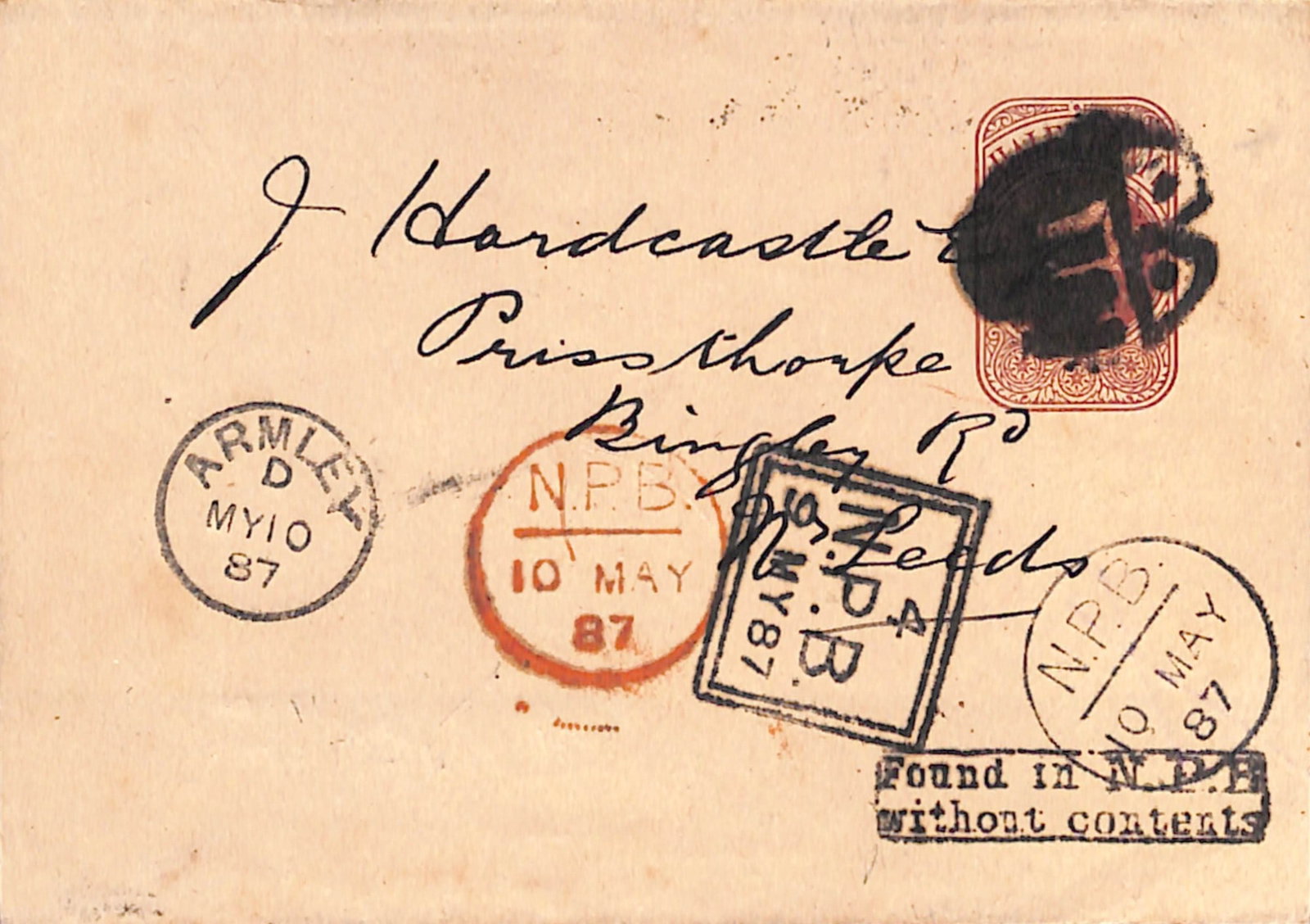Title: G.B - London 1887 (May 9) Description: 1/2d Wrapper from London to Leeds handstamped boxed ": Title: G.B - London 1887 (May 9) Description: 1/2d Wrapper from London to Leeds handstamped boxed "Found in N.P.B/without contents", circular N.P.B datestamps in red and black and boxed datestamp in