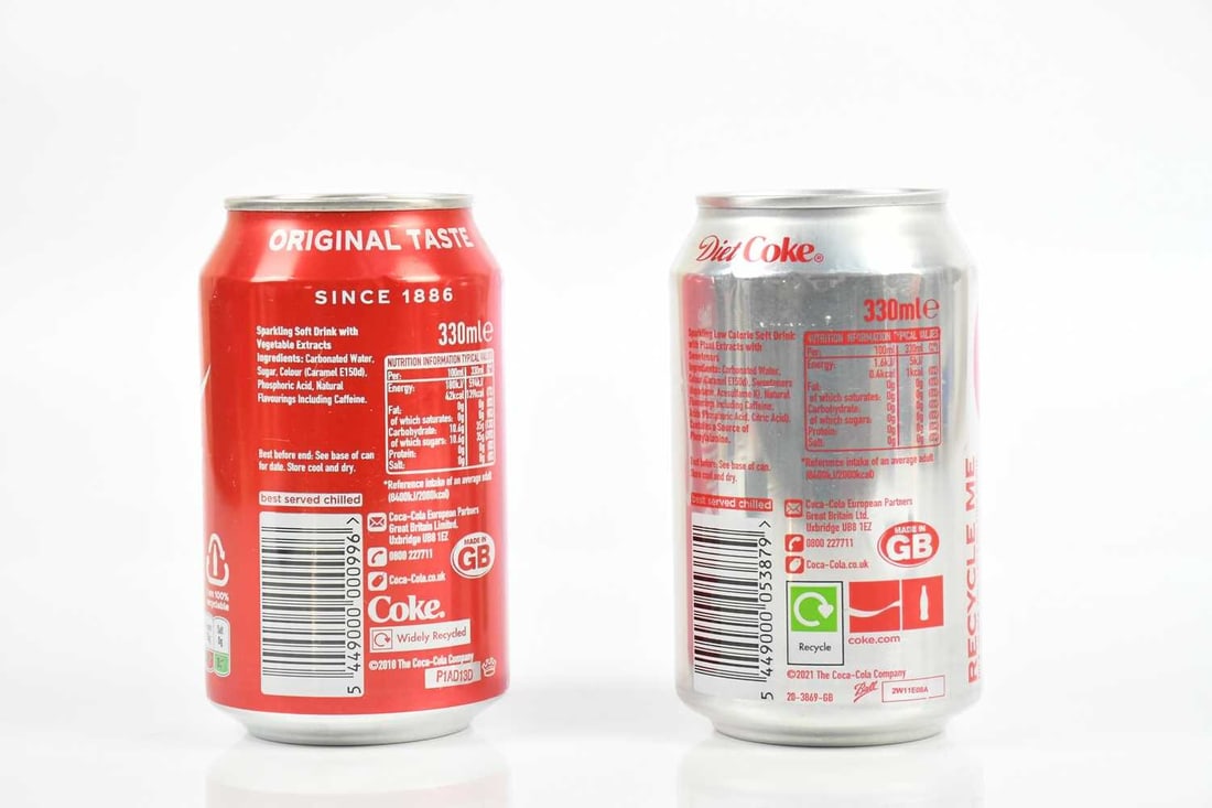 Pair of Signed Coke Cola Limited Edition Cans (With Coke) By Damien Hirst: Title: Pair of Signed Coke Cola Limited Edition Cans (With Coke) By Damien Hirst Description: Damien Hirst signed these cans as part of a London show A great easy way to have Original Damien
