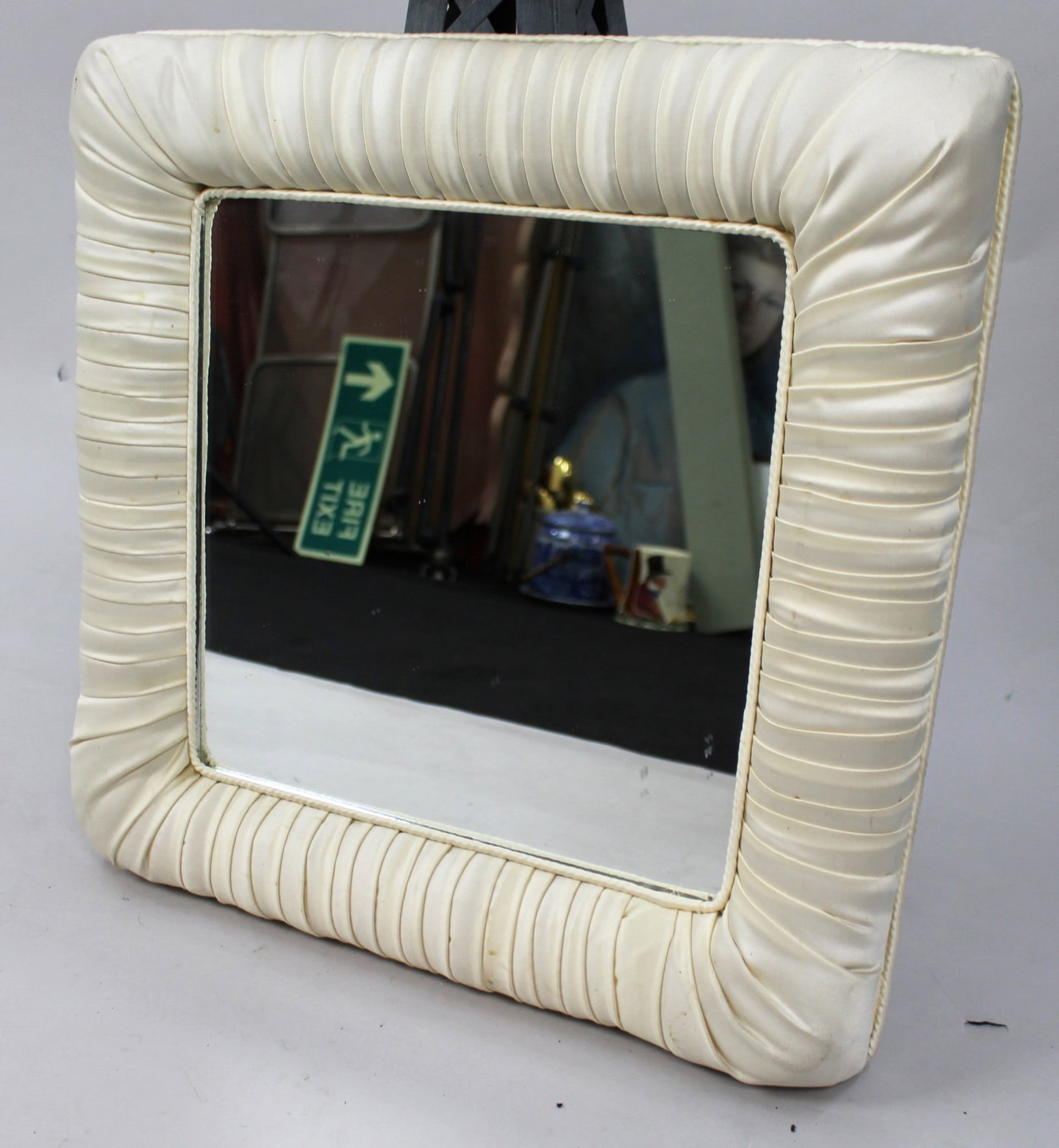 Square Mirror with Padded Upholstered Frame: Title: Square Mirror with Padded Upholstered Frame Description: Square Mirror with Padded Upholstered Frame. Measures 46 x 46 x 4 cm. Some marks to frame, good condition Condition: Used Delivery