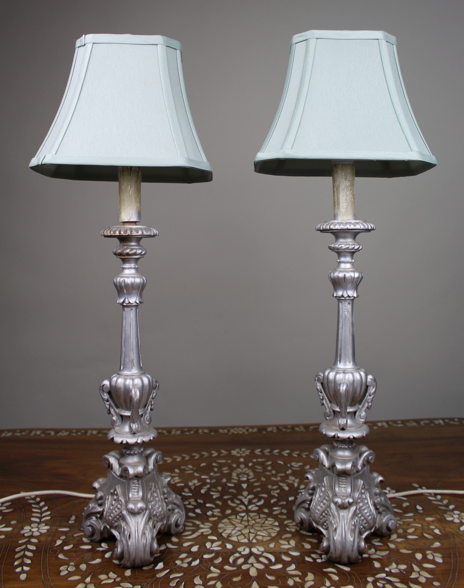 Pair of Silver Carved Table Lamps: Title: Pair of Silver Carved Table Lamps Description: Pair of Silver Carved Table Lamps. Height 73 cm. Condition: Used Delivery option:
