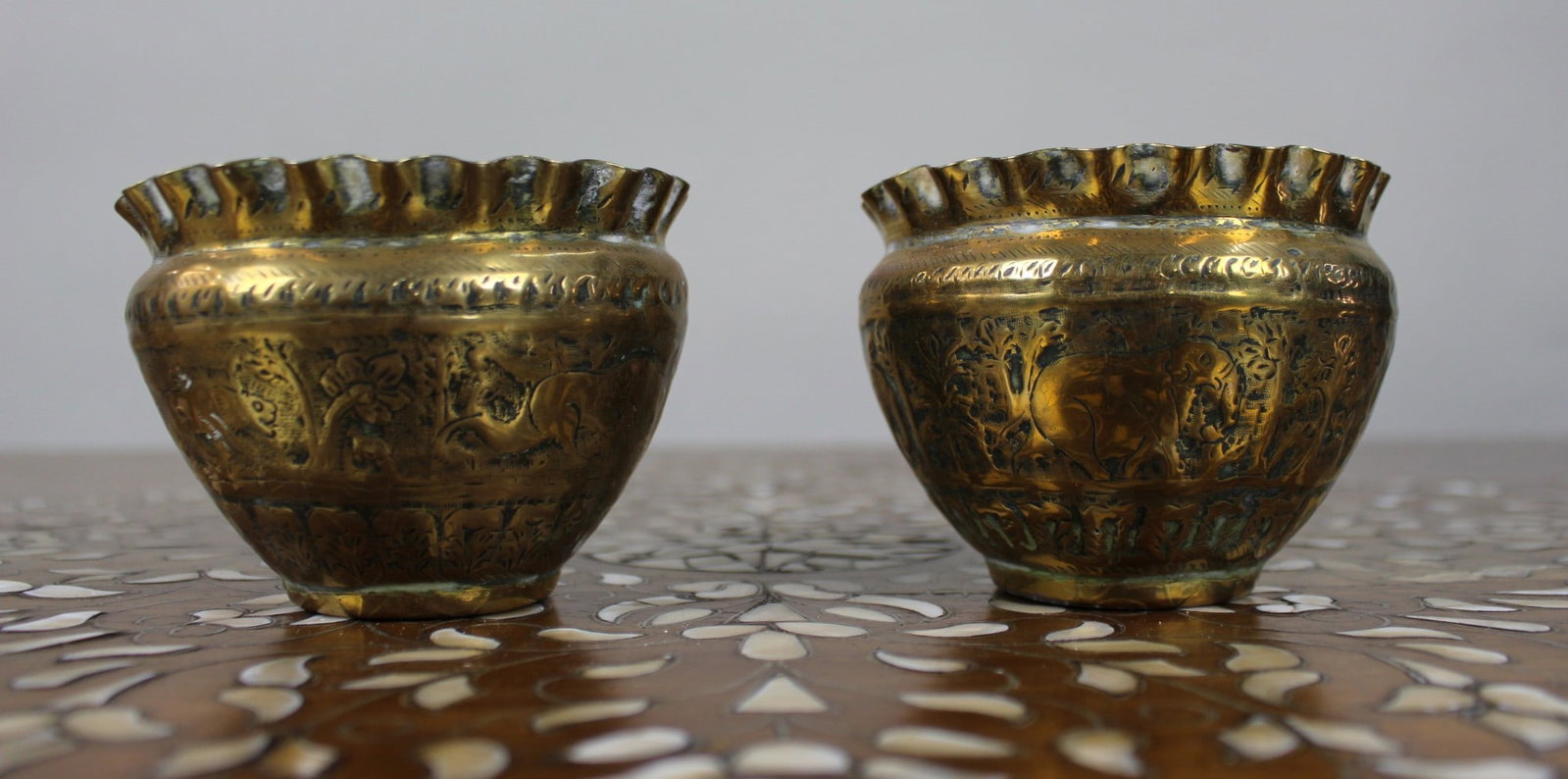 Pair of Hand-Engraved Indian Brass Bowls with Elephant and Deer Decoration: Title: Pair of Hand-Engraved Indian Brass Bowls with Elephant and Deer Decoration Description: Pair of Hand-Engraved Indian Brass Bowls with Elephant and Deer Decoration A decorative pair of Indian