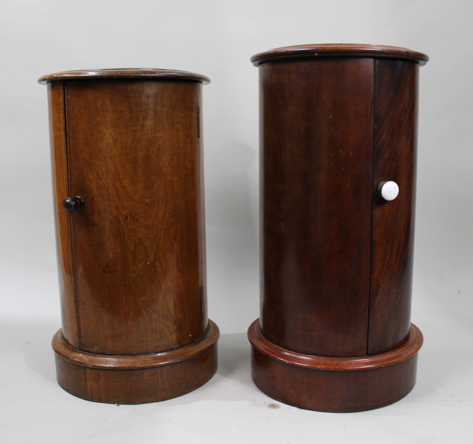 Pair of Victorian Marble Topped Cylindrical Mahogany Pot Cupboards: Title: Pair of Victorian Marble Topped Cylindrical Mahogany Pot Cupboards Description: Pair of Victorian Mahogany Cylindrical Pot Cupboards with Marble Tops England, circa 1860 A fine