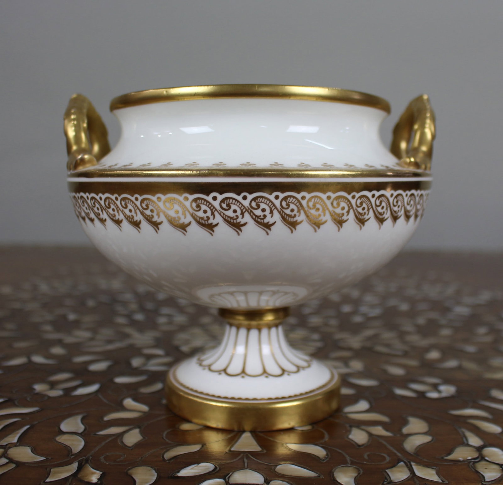19th Century English White & Gilt Two-Handled Porcelain Urn: Title: 19th Century English White & Gilt Two-Handled Porcelain Urn Description: 19th Century English White & Gilt Two-Handled Porcelain Urn A well-made English porcelain urn from c