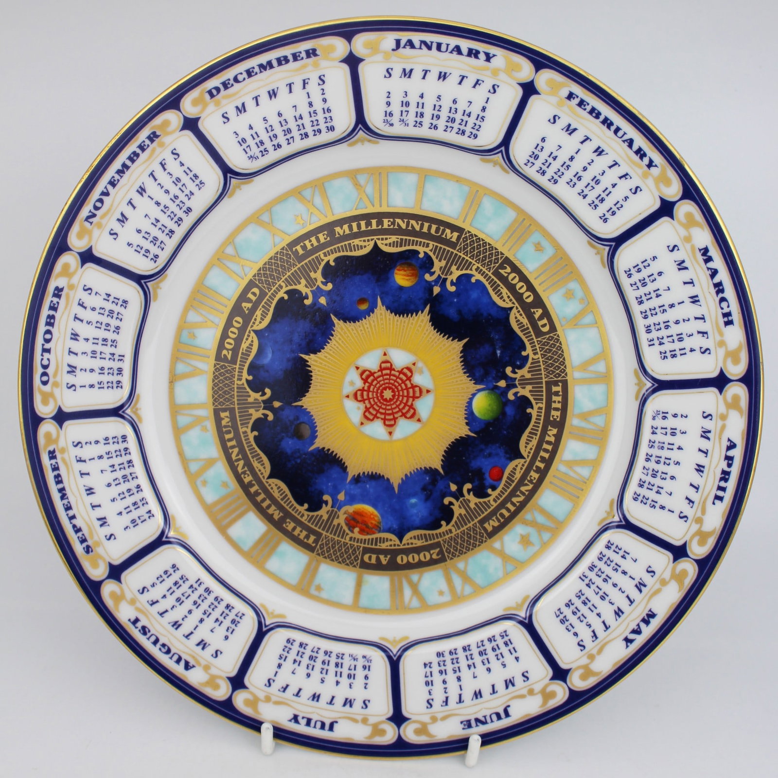 Royal Worcester Millennium Calendar Plate: Title: Royal Worcester Millennium Calendar Plate Description: Royal Worcester Millennium Calendar Plate. Width: 27 cm. Very good condition; no chips, cracks or repairs, very light scratches only