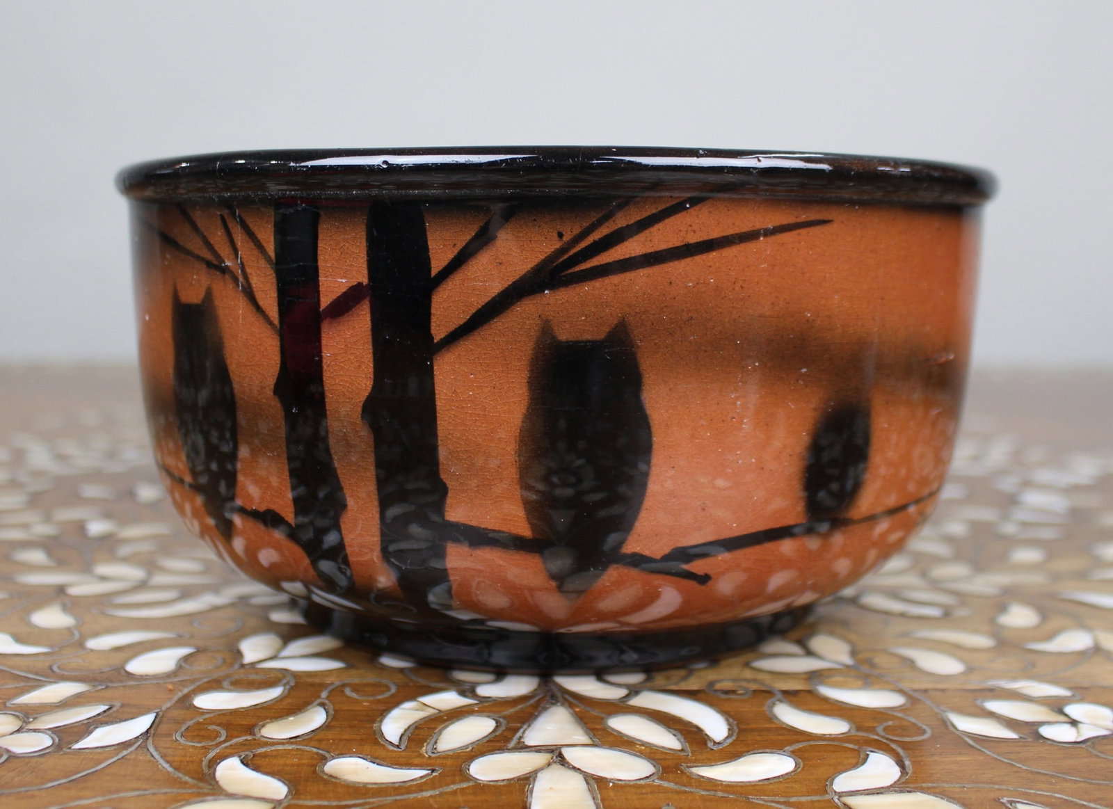 Studio Pottery Owl Bowl: Title: Studio Pottery Owl Bowl Description: Studio Pottery Owl Bowl A late 20th-century studio pottery stoneware bowl, decorated with black slip silhouettes of owls and trees in a moonlit landscape.