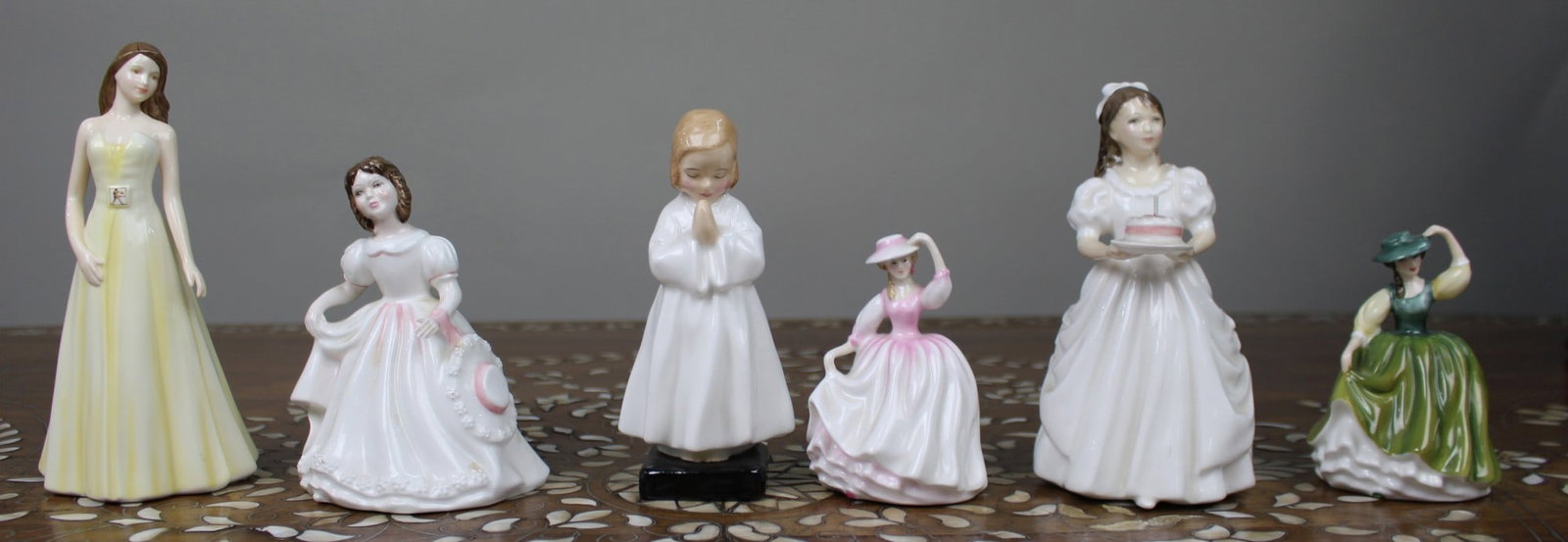 Collection of 6 Royal Doulton Figurines: Title: Collection of 6 Royal Doulton Figurines Description: Collection of 6 Royal Doulton Figurines A mixed group of six Royal Doulton ladies, including: • Claire HN3694 • Amanda HN3905