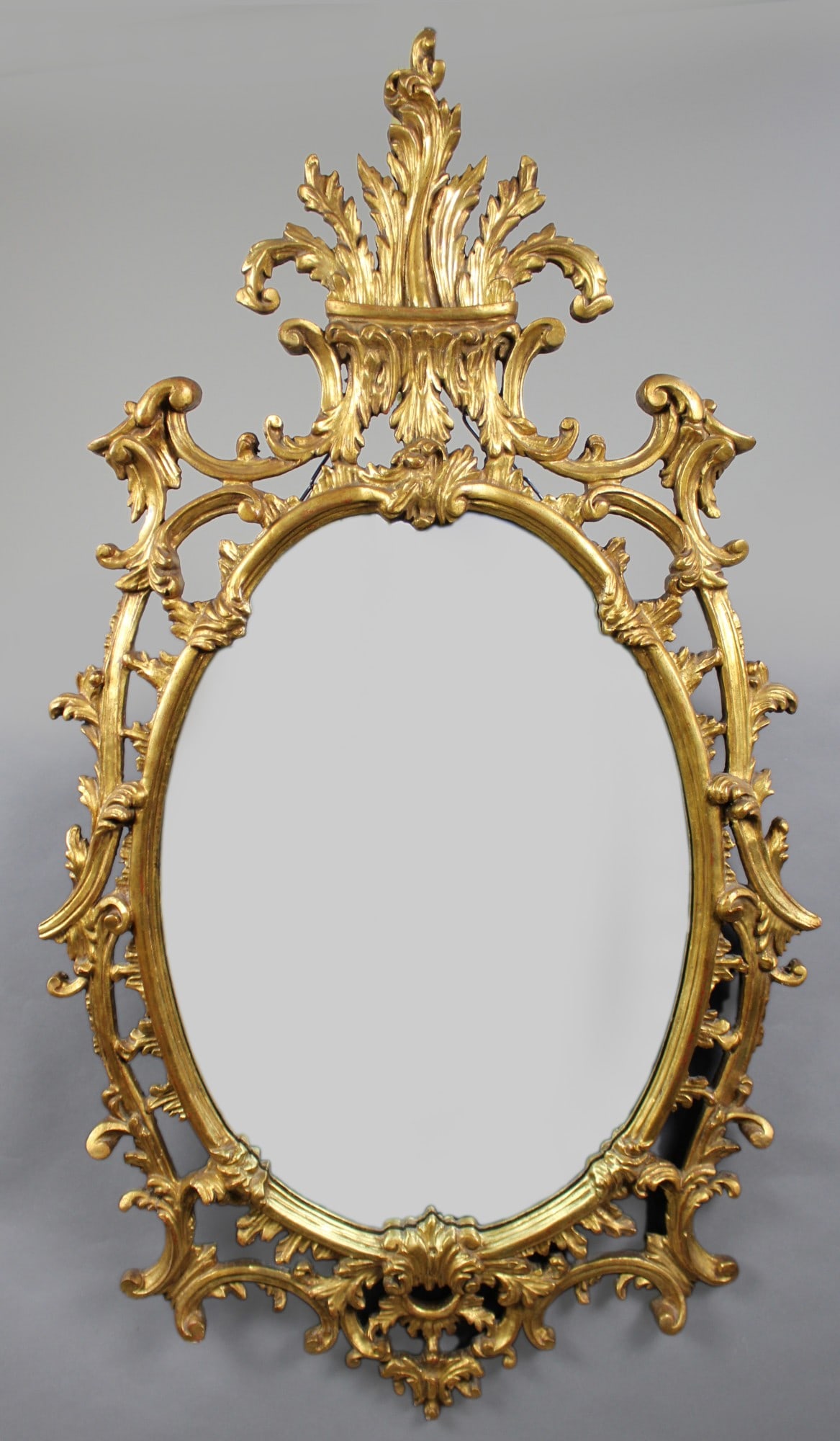 Florentine Giltwood Rococo Revival Wall Mirror, Italy, Mid-20th Century: Title: Florentine Giltwood Rococo Revival Wall Mirror, Italy, Mid-20th Century Description: Impressive Florentine Giltwood Rococo Revival Wall Mirror, Italy, Mid-20th Century Offered is an
