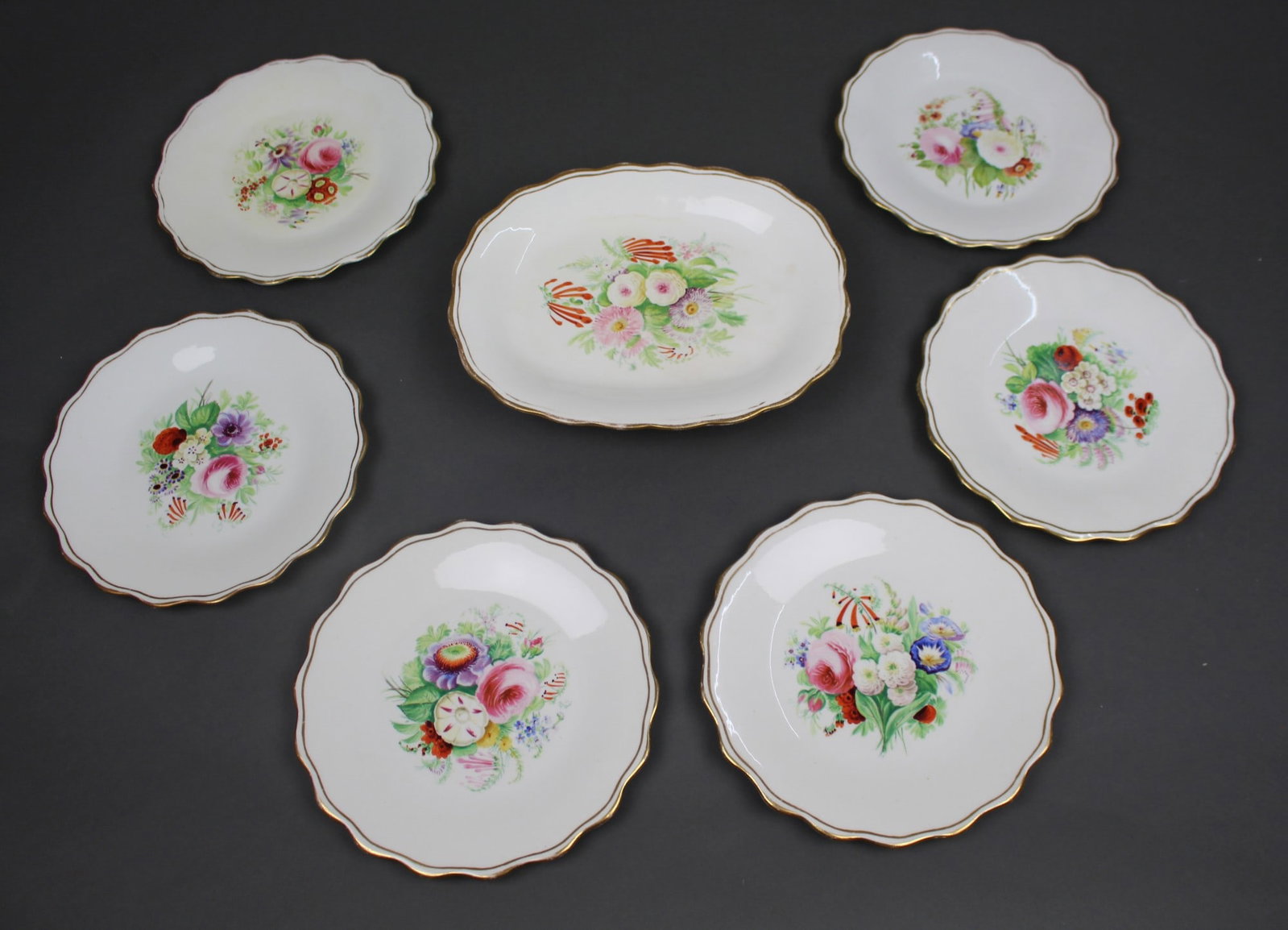 7 Piece Hand Decorated Floral Dessert Set: Title: 7 Piece Hand Decorated Floral Dessert Set Description: 7 Piece Hand Decorated Floral Dessert Set A vintage English bone china dessert set, comprising a raised oval pedestal comport and six