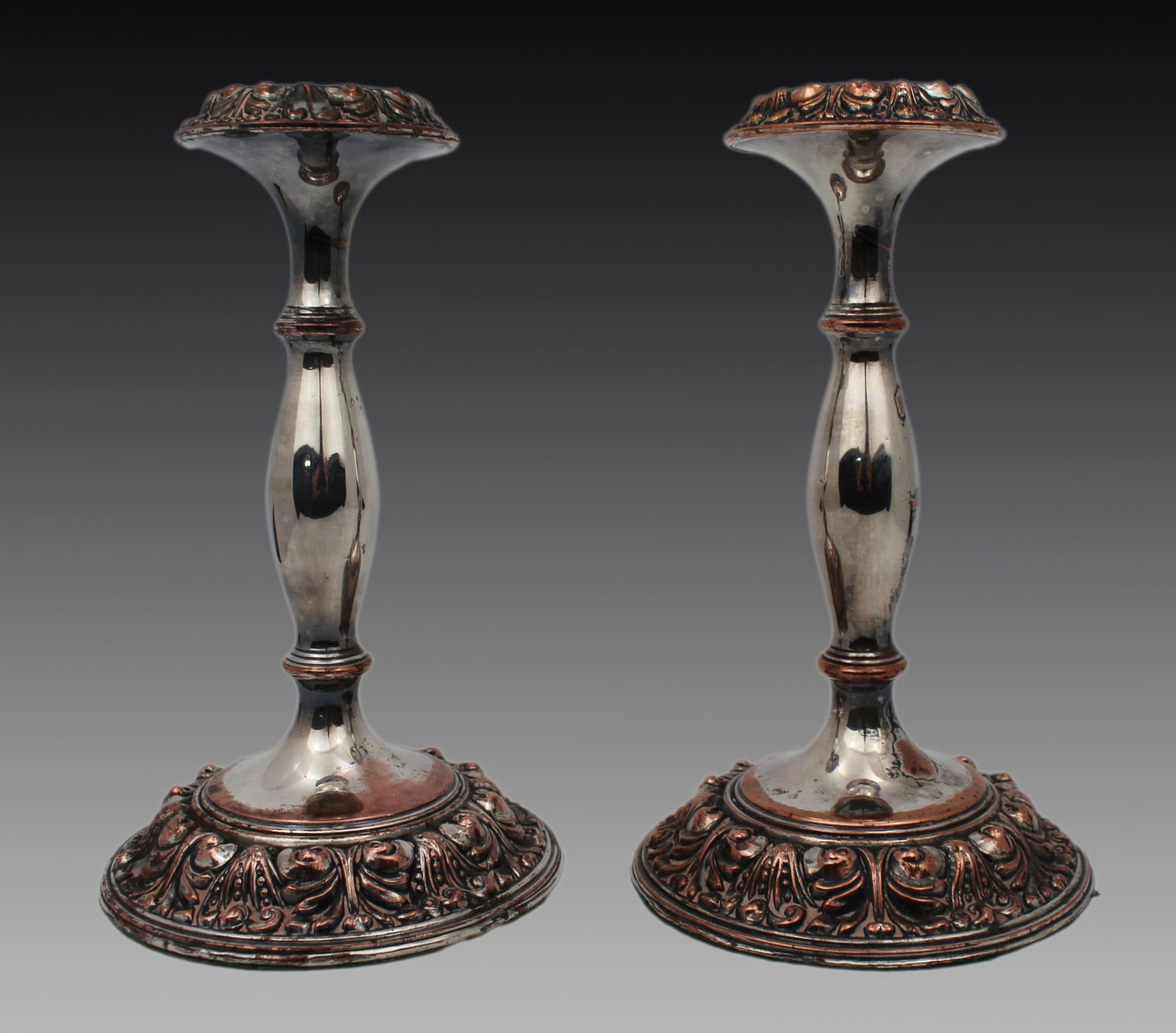 Pair of Antique Sheffield Plate Candlesticks: Title: Pair of Antique Sheffield Plate Candlesticks Description: Pair of Antique Sheffield Plate Candlesticks A good pair of 19th-century Sheffield plate candlesticks, of classic baluster form with