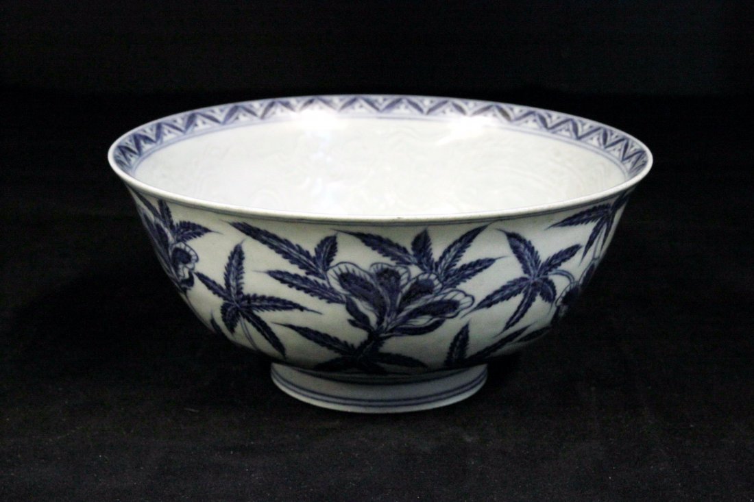 Elegant Ming Dynasty Blue & White Palace Bowl: Diameter 8 in., H 3.75 in. This was an elegant palace bowl of the Xuande Period (1426-1435). It was decorated with floral patterns on the outside and incised with dragons in the inside. It was very ra