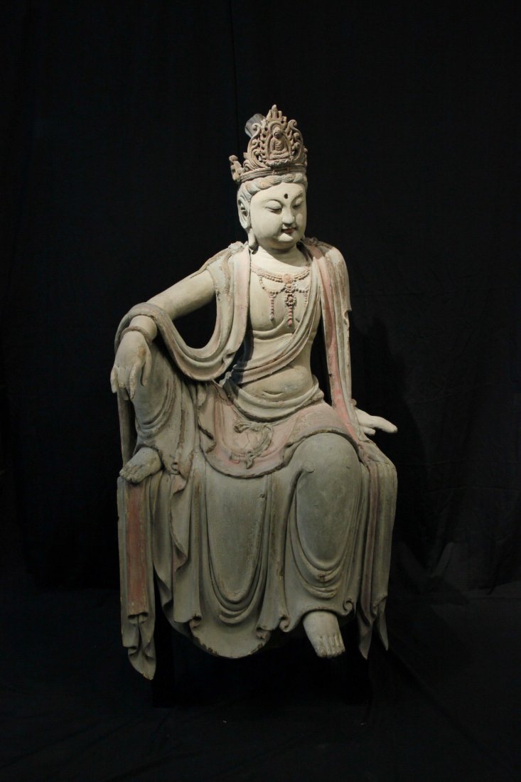 Important Northern Song Dynasty Wood Polychrome Guanyin: L 29 in., W 26 in., H 51 in. This was a very important wood Guanyin with polychrome coloring of the Song Dynasty (960-1127). The craftmanship was the most outstanding at that time. The facial expressi