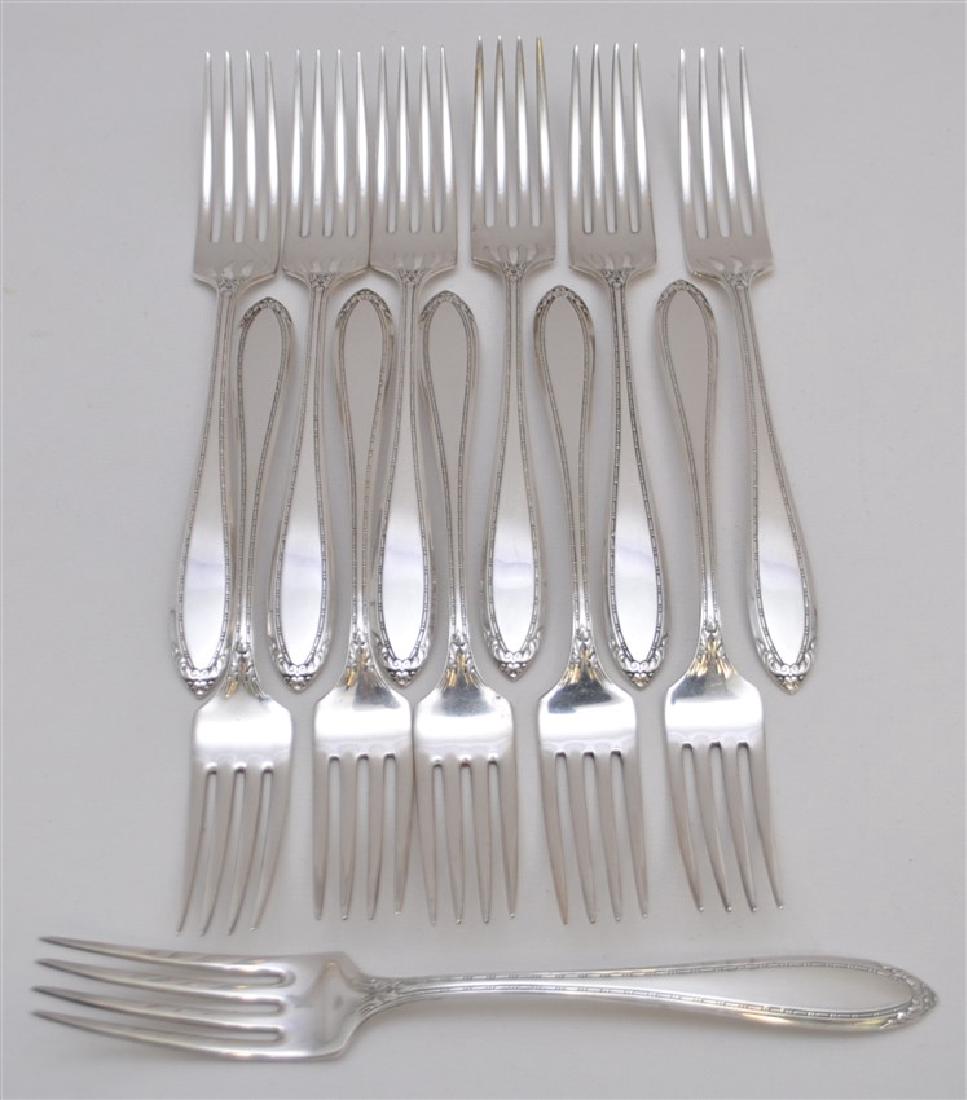 12 STERLING SILVER DINNER FORKS - LADY BETTY: 12 Sterling Silver Dinner Forks in the Lady Betty Pattern c. 1920 by International Silver. No Monograms. Each Measures 6 1/8" long. Total Weight is 490 grams. PROVENANCE: A Charleston SC Private Estat