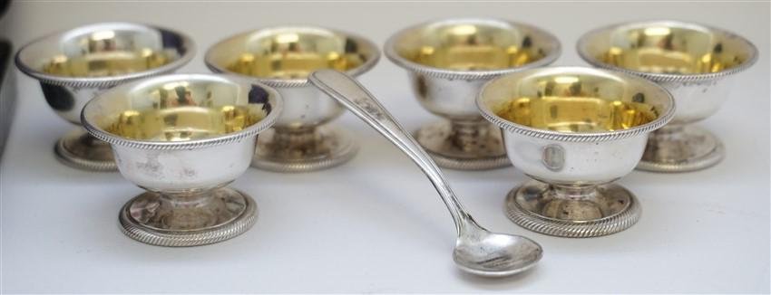 6 STERLING SILVER SALT CELLARS BOXED SET: Victorian Boxed Set of 6 Sterling Silver Footed Salt Cellars with Gold Wash Interiors. The cellars are unmarked and still in the original black tooled leather presentation case. Included is a Webster 
