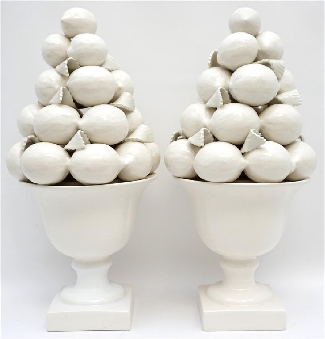 PAIR TALL MAJOLICA LEMON CENTERPIECES: Matched pair of Vintage mid century Sculptures or Centerpieces, made exclusively for Great City Traders in San Fransisco. White majolica glazed, made in Portugal, Urns of stacked lemons. Each measures