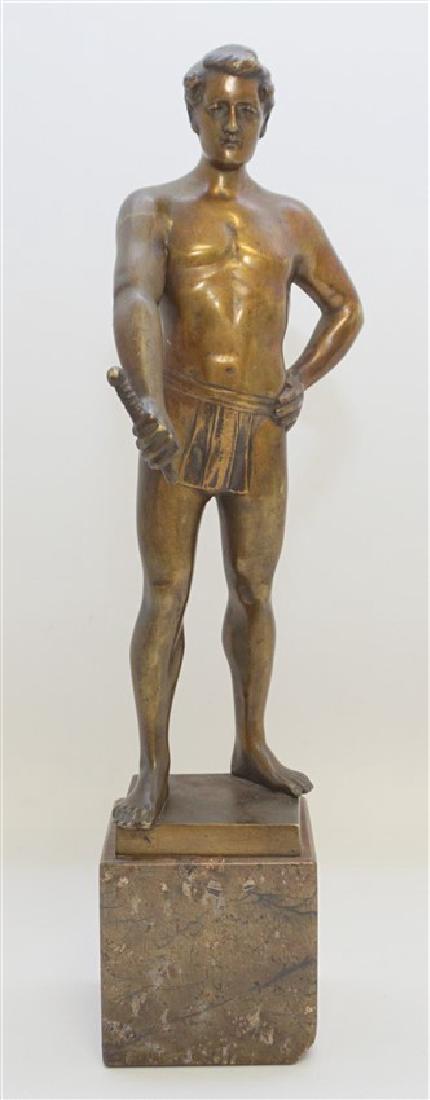 HANS KECK GERMAN BRONZE SCULPTURE: Hans Keck (German, active 1920-1922) Patinated Bronze Sculpture of a Young Man, on marble plinth, signed. Missing the sword blade. Size: 12.25" x 2.75" x 2.25", 31 x 7 x 6 cm; 9.25"H, 23 cm (bronze).