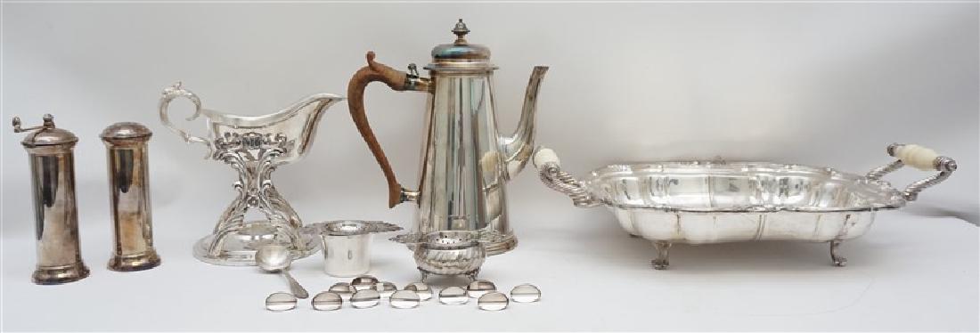 LOT OF VINTAGE ORNATE SILVER PLATE: All Silverplated, all older. 1 - Divided Casserole, footed with scrolled handles. removable divider 17"x10"x4". 2- Steiff Williamsburg Coffee Pot with wood handle, hinge needs to be soldered 8"x5"x10"