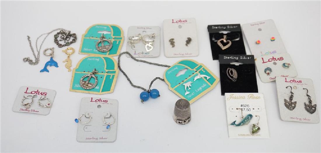 DEALER LOT - STERLING SILVER JEWELRY: 1- Sterling Heart Pendant with tiny gemstones Necklace. 2- Doskow Sterling Made in England Thimble. 3- Two Sterling Cape Hatteras Lighthouse Charms. 4- Sterling Dolphin Pierced Earrings 5- Sterling Ca