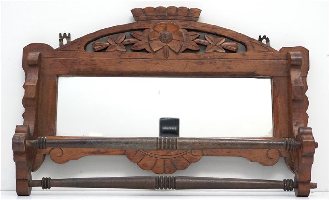 AMERICAN CARVED MIRROR TOWEL RACK: Antique Hand Carved American Mirrored Hanging Towel Rack: Carved flower and leaf top with 2 towel bars. No condition problems. Measures 20"x12"x5". Weight 3 pds.