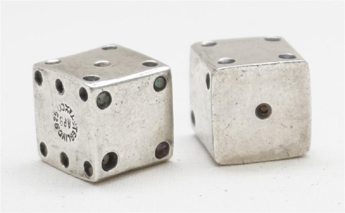 2 STERLING SILVER TAXCO DICE: Two Vintage Sterling Silver Taxco Dice. Marked on the dice STERLING 925 TAXCO APB. They have a total weight of 6.7 grams and measure 11.3mm square. Very unique and highly collectible. Mid century. PRO