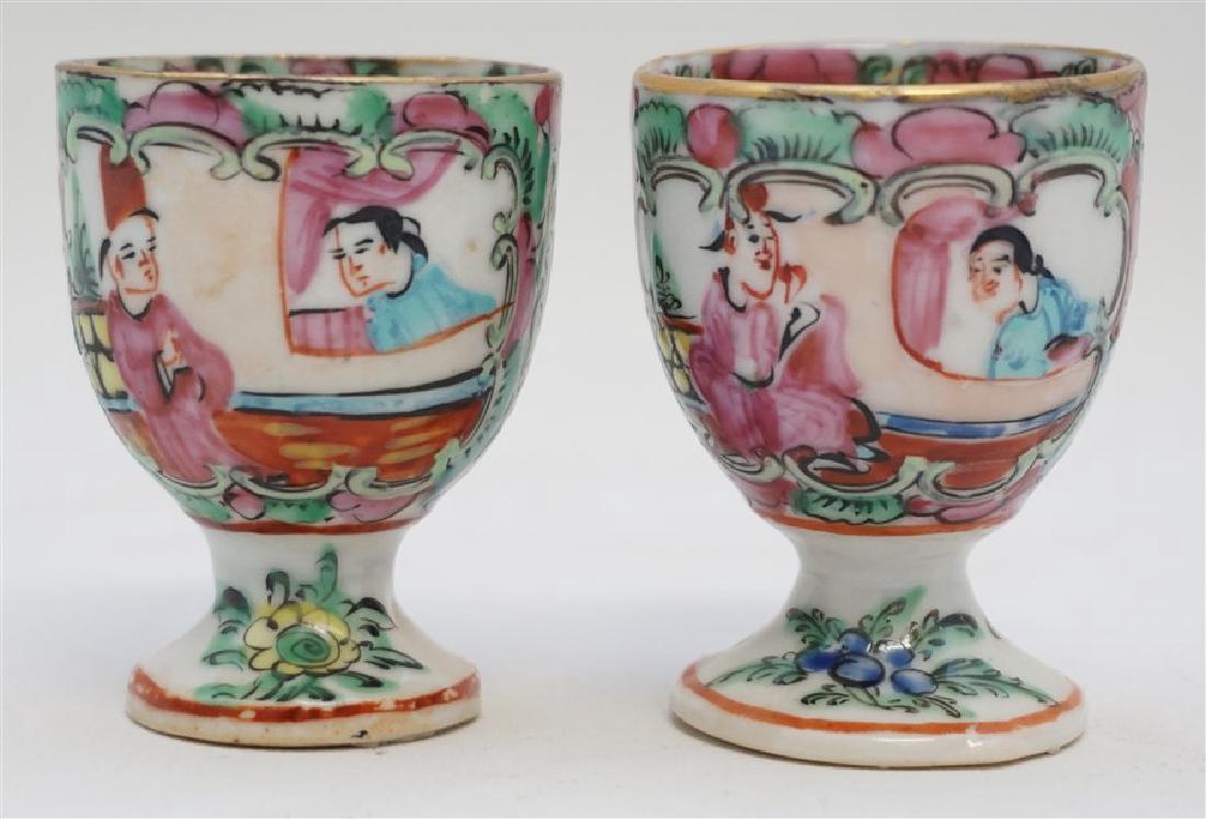 2 QING DYNASTY ROSE MEDALLION EGG CUPS: Two Antique Qing Dynasty c. 1890-1900 Chinese Porcelain Rose Medallion Egg Cups. Good Condition. Top border has roses and greenery. PROVENANCE: A Charleston SC Private Estate.