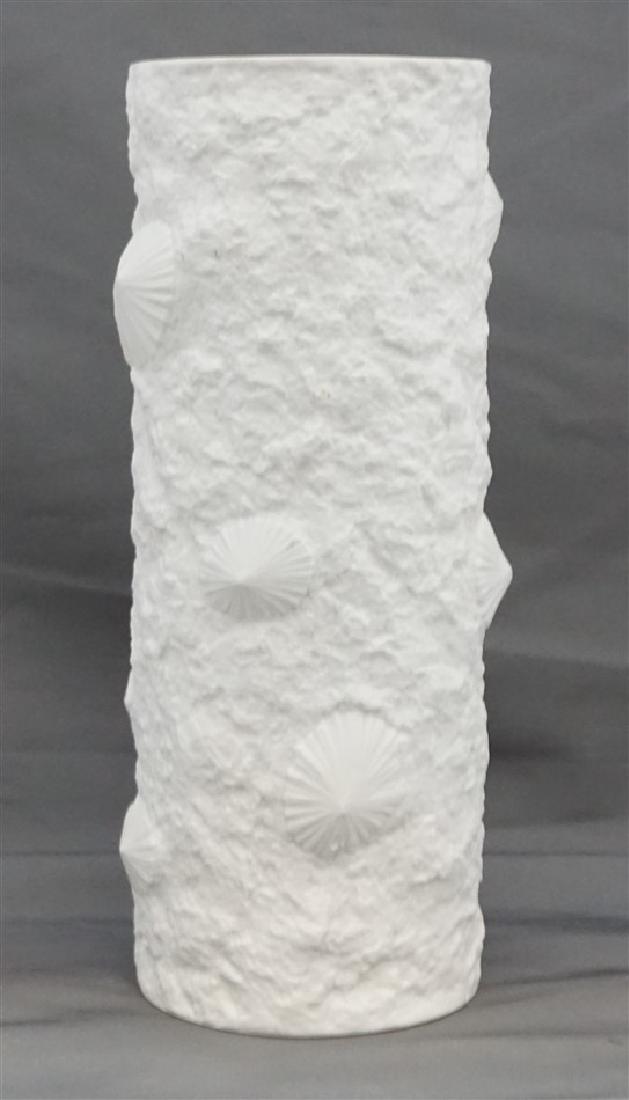 MID CENTURY HUTSCHENREUTHER FUCHS VASE: Vintage Dr. Heinrich Fuchs c. 1970 Hutschenreuther Cylinder Vase. Matte White Vase Modern Design from the Op Art Line. Measures 3.50"x3.50"x9.50". Weight 1 pd 2 oz. The Hutschenreuther porcelain facto