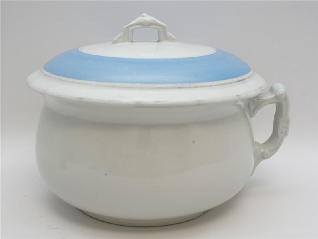 EAST TRENTON POTTERY CHAMBER POT: Antique American East Trenton Pottery Company Chamber Pot with lid. With hallmark used c. 1890. White with blue ironstone, inside of lid with chip. Measures 10"x9.50"x7.50. Weight 5 pds 4 oz.
