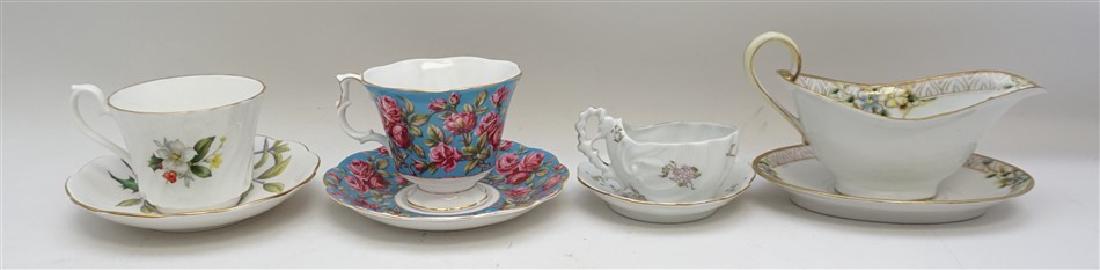 8 pc. PORCELAIN ROYAL ALBERT + LIMOGES: All in Good Condition. 1- Limoges Porcelain Shell Cup and Shell Saucer. Saucer 4", Cup 2". 2- Royal Albert "Harewood" Cup and Saucer, Pink Roses on Blue. Saucer 5.50", Cup 3". 3- House of Goebel, Staf