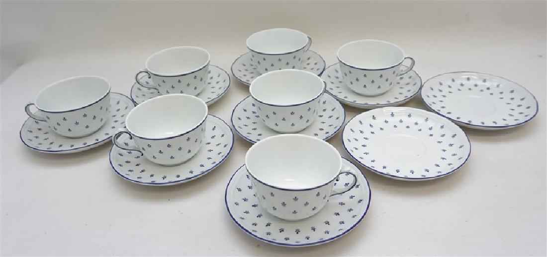 16 RICHARD GINORI ROYAL BLUE CUPS & SAUCERS: Seven Richard Ginori Royal Blue Antico Doccia Flat Cup & Saucer Sets and 2 additional saucers . Made in Italy. All in good condition. Each cup measures 2 1/4". Saucers 5 3/4".They all feature a blue f