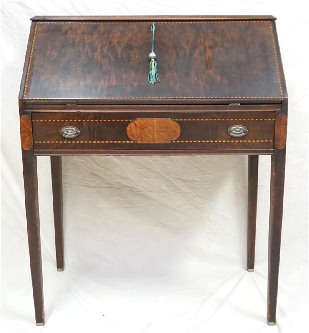 VICTORIAN INLAID SLANT FRONT WRITING DESK: American Late Victorian Inlaid Small Slant Front Desk. Hinged drop front, fitted interior. Some minor wear. Good for small spaces these were often utilized as Ladies Writing Desks. Measures 32"x18"x40