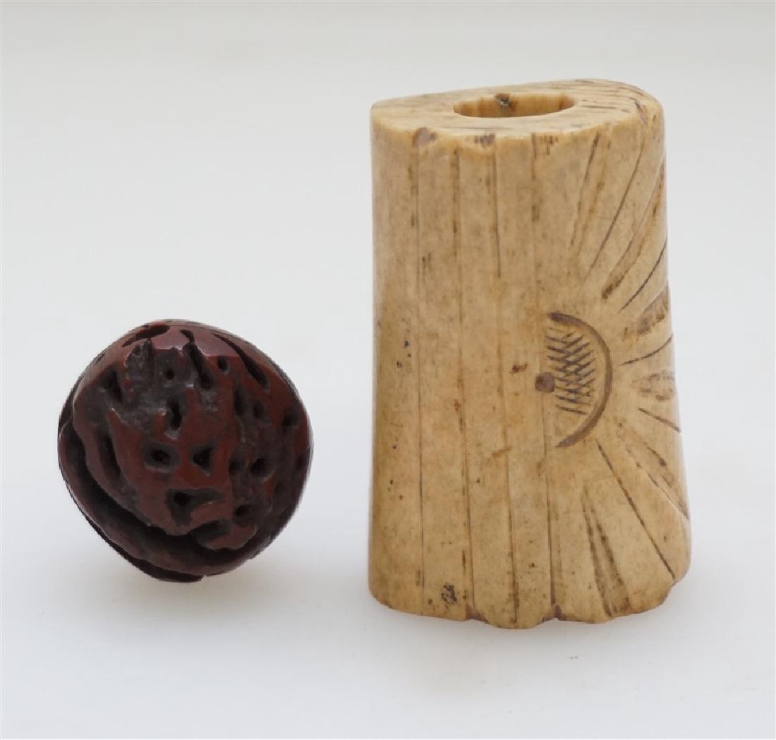 2 JAPANESE ANTIQUE NETSUKES: The first a carved bone Netsuke c. 1870-1890, with sunrise, 2". Next a realistically carved Walnut Shape Netsuke c. 1920 1.10" inch. Weight combined 1.2 oz. PROVENANCE: A Charleston SC Private Estate.