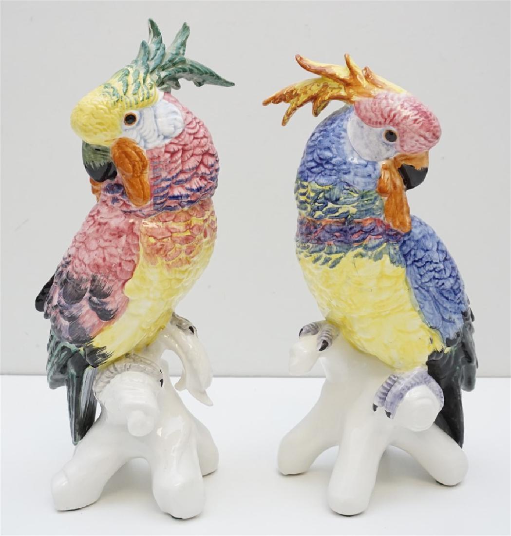 PAIR OF CHELSEA HOUSE ITALIAN PARROTS: Pair of Italian Porcelain Parrots. Hand painted pink, blue, and yellow bodies. Made in Italy for Chelsea House. Chelsea House Parrots were featured in Coastal Living Magazine. Approx 6"x4 1/2"x13 1/2"