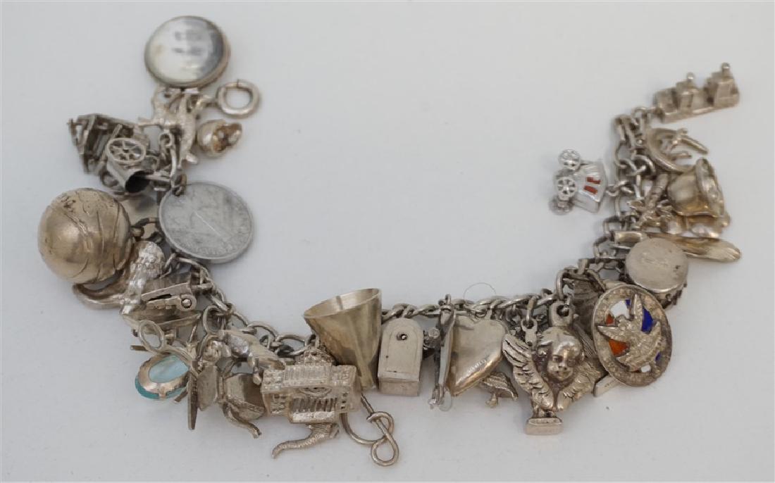 LOADED STERLING SILVER CHARM BRACELET (1 of 6)