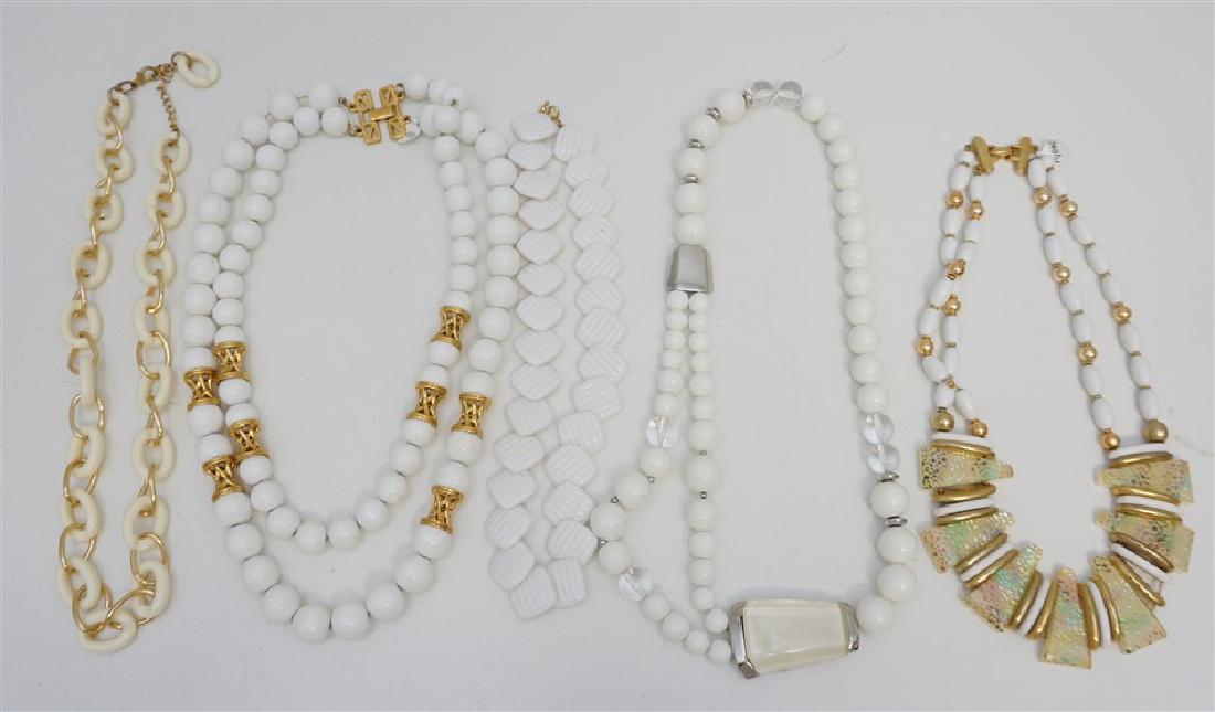 5 LARGE ESTATE TRIFARI - MONET +: Five Vintage Estate White and Ivory Necklaces. Perfect for summer. Trifari and Monet are the makers of the 2 largest ones. All are in very good condition. Weight 1 pd 1 oz. PROVENANCE: A Charleston SC