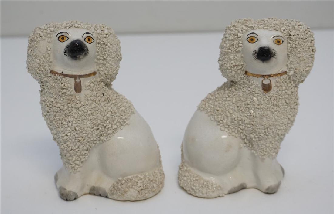 PAIR ENGLISH STAFFORDSHIRE POODLES: Older Pair of Exceptional Seated English Staffordshire Poodles late 19th, eary 20th c. Both with sieved clay coats, gilt collar and lockets, small firing holes on base unlike larger casting holes for 