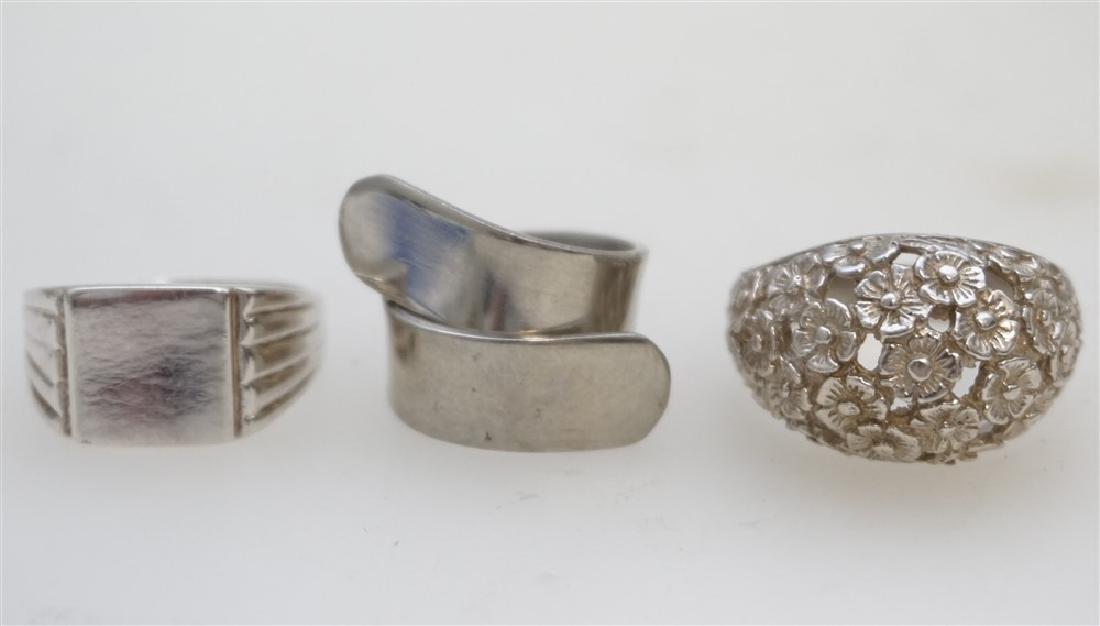 THREE SILVER RINGS (1 of 4)