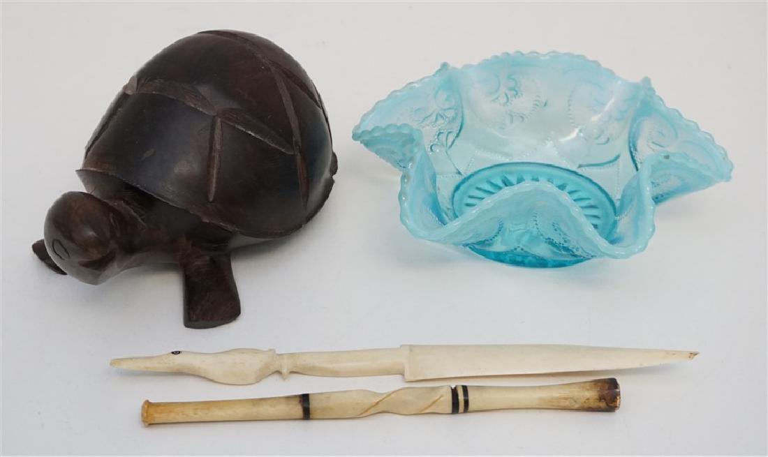 4 PC LOT CARVED TURTLE - GLASS +: 1- Hand carved rosewood turtle 6". 2- Blue Opalescent Candy Bowl 5 7/8". 3- Caved bone bird letter opener 8", nick to tip. 4- Carved bone cigarette holder 6 3/8". Great lot for dealers or collectors. 
