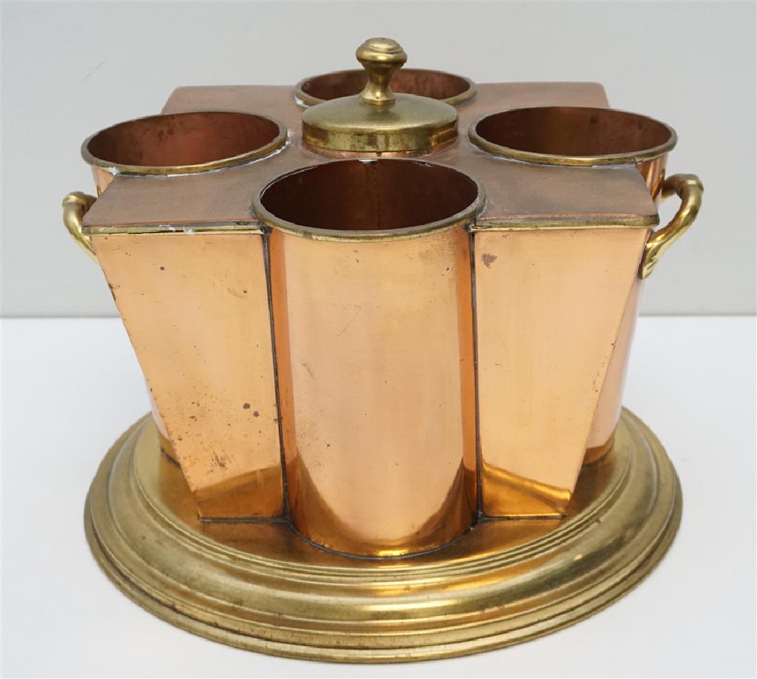 ART DECO ENGLISH COPPER WINE COOLER: Exceptional early 20th century English Art Deco Copper Champagne / Wine cooler. These were often used on Ocean Liners. In copper and brass, of stylish Art Deco form. The tapering square bodies with a 