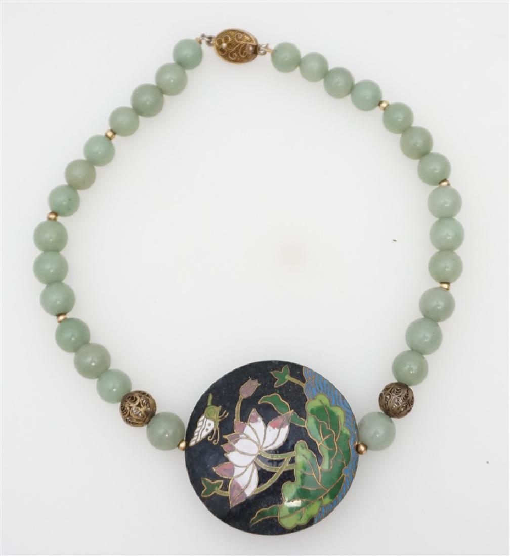 ESTATE JADE AND CLOISONNE NECKLACE: Vintage Estate Jade and Cloisonne Choker Necklace. Enameled Cloisonne Center 2" with Lotus and Butterfly. Measures 15" opened. Good condition. Weight 4 oz. PROVENANCE: A Pawleys Island SC Private Esta