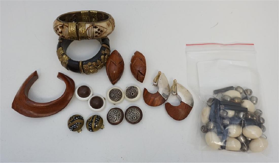 10 PC VINTAGE ESTATE HORN - WOOD - BONE: 10 Piece Vintage Estate Jewelry. 3 Carved Bracelets, one bone, one horn and one wood. 6 Pair of Clip on earrings including sterling, wood, west germany and more. In addition there is a Anne Klein Neck